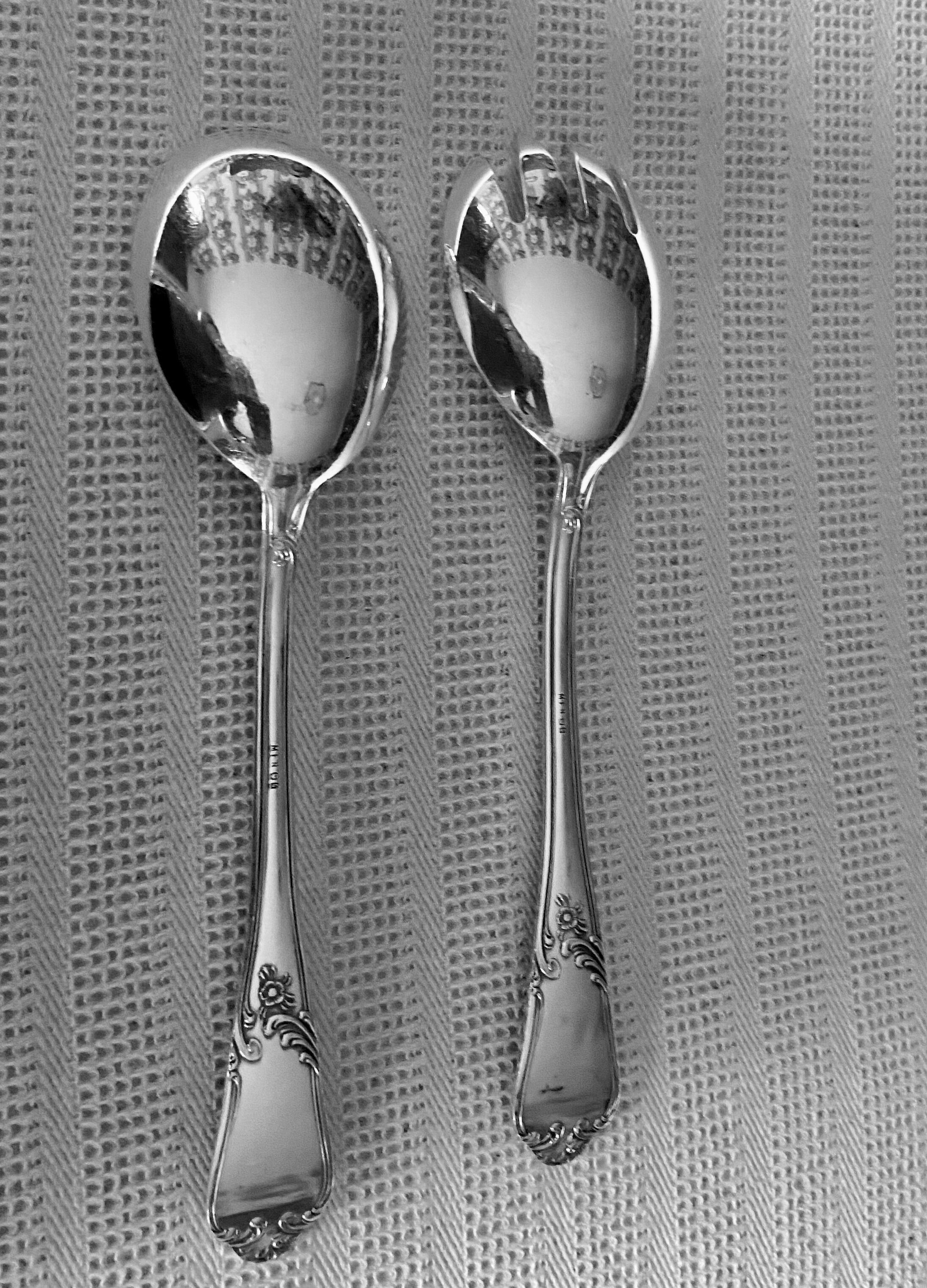 Silver metal salad servers