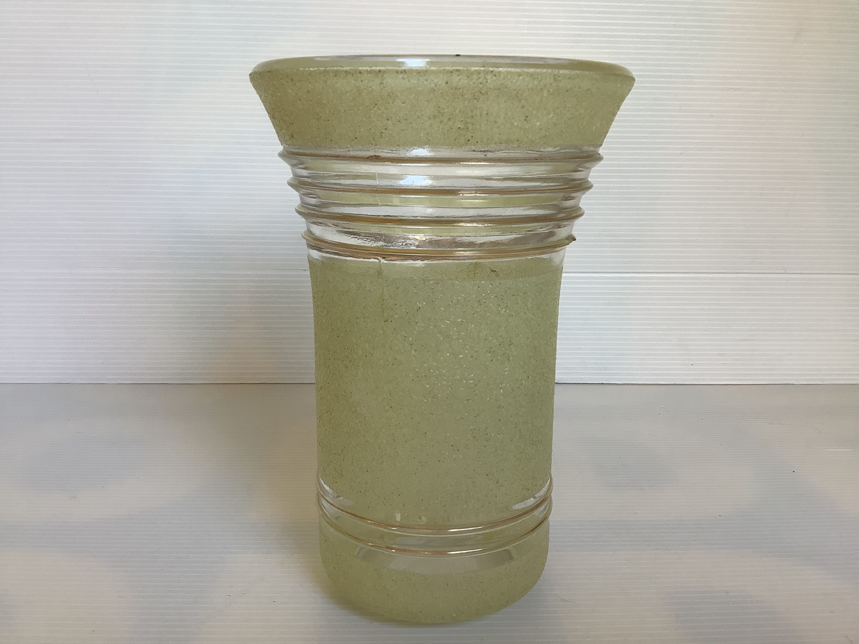 Old yellow frosted glass vase