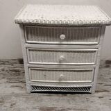 White rattan chest of drawers and bedside table