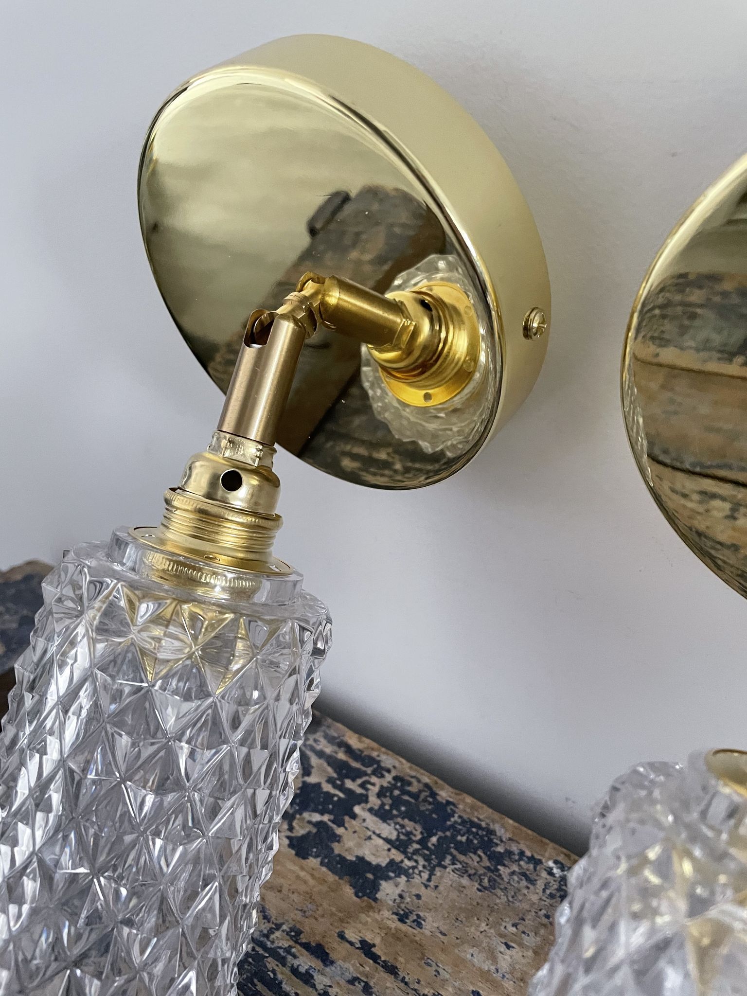 Pair of vintage electrified glass wall lamps