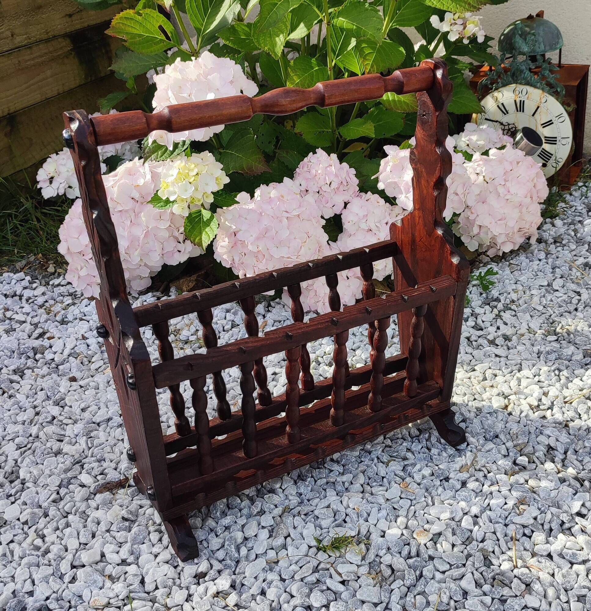 Rustic stained wooden magazine rack
