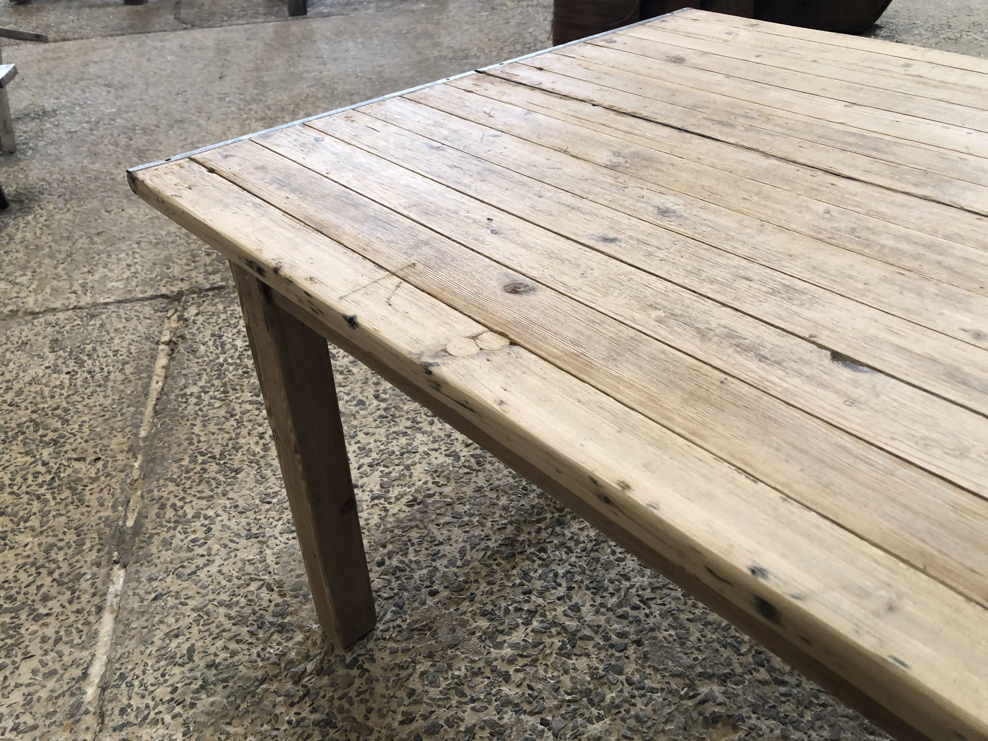 Washed-out wooden dining table