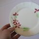 4 assiettes vintage Royal Art Pottery