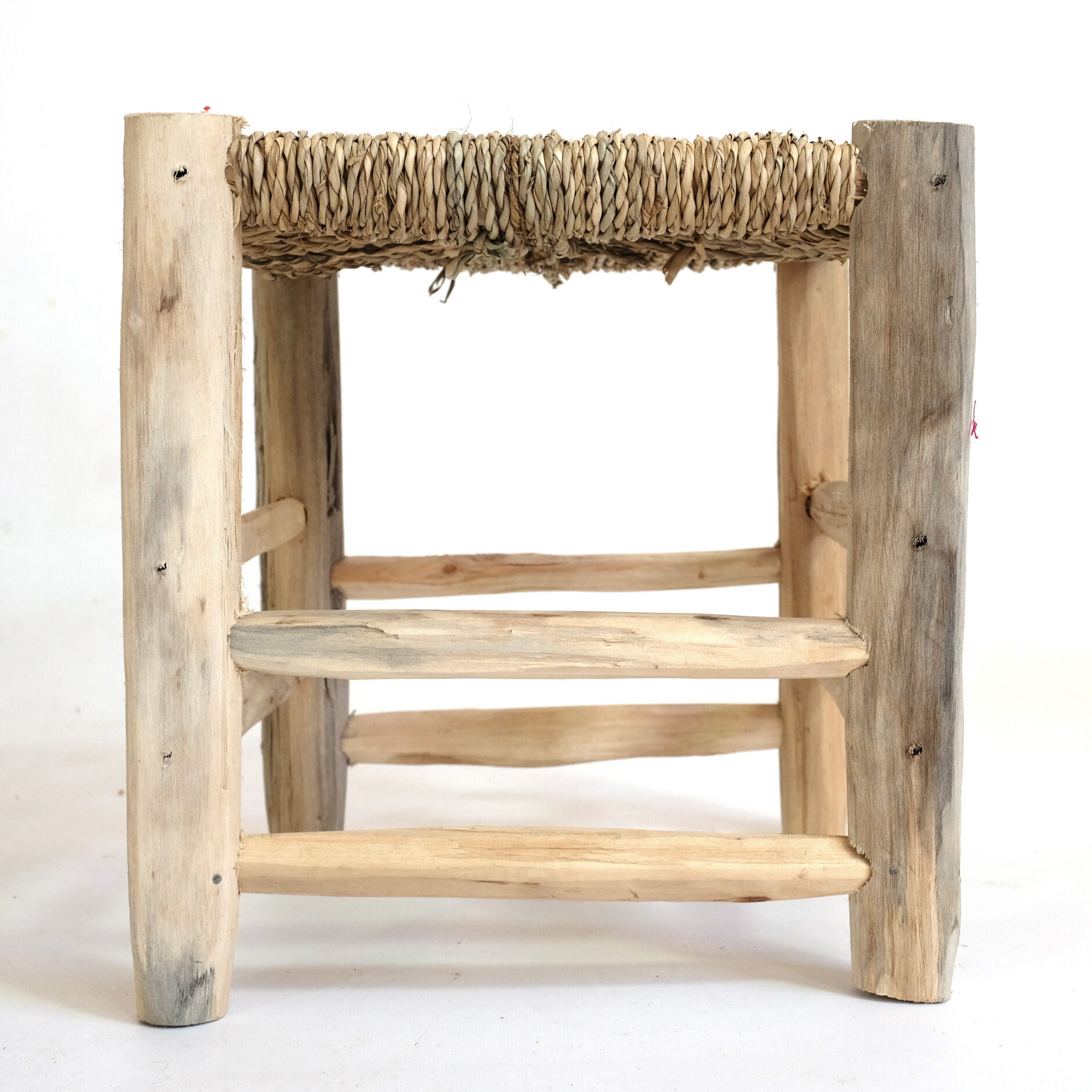 Minimalist stool made of wood and rope