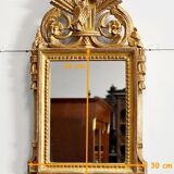 Miroir en bois doré, style Louis XVI – 1ère partie XXe - 60x30cm