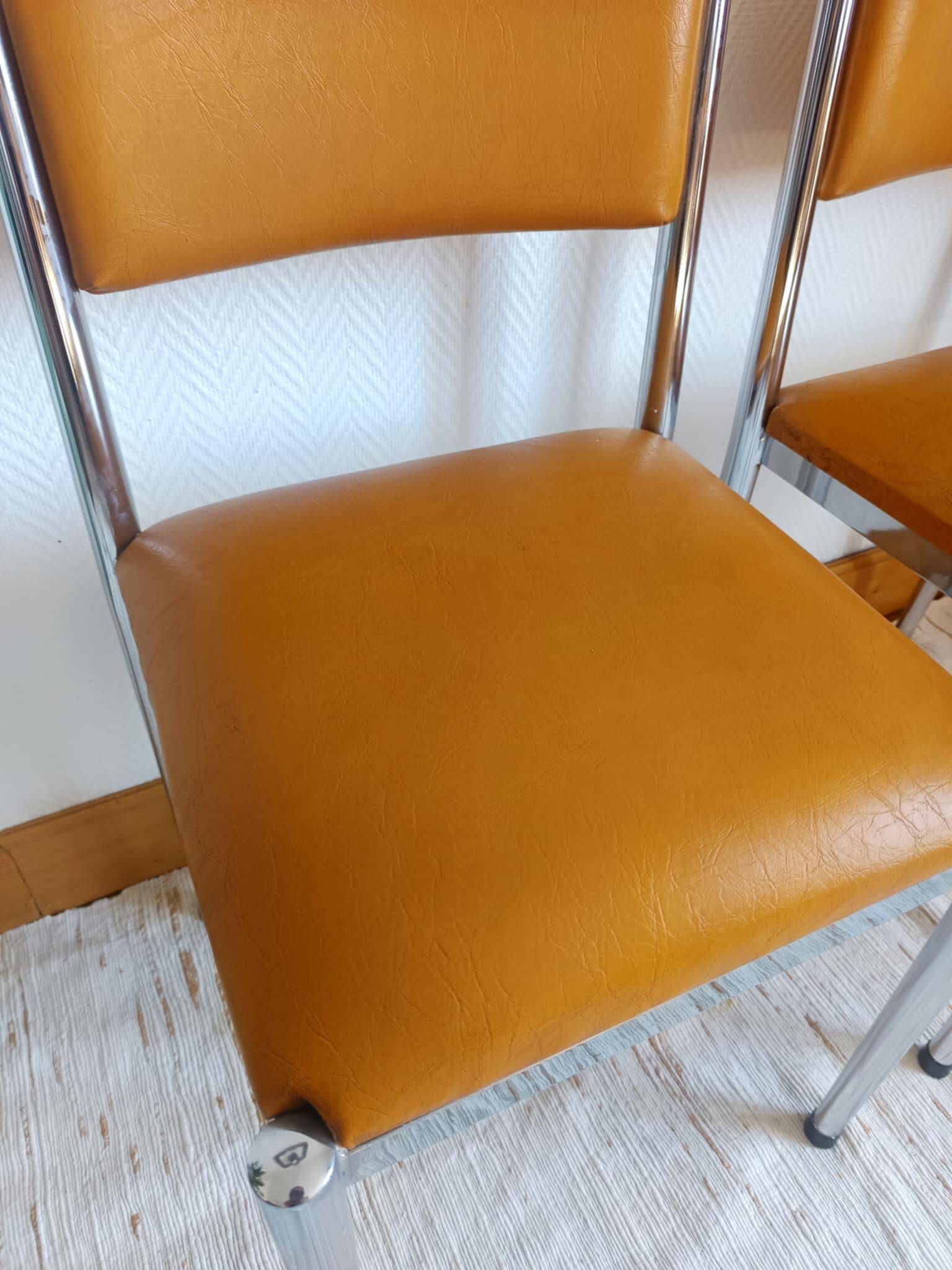 Pair of vintage leatherette and chrome chairs from the 1970s
