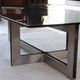 Smoked glass coffee table, brushed stainless steel base, 1970s.