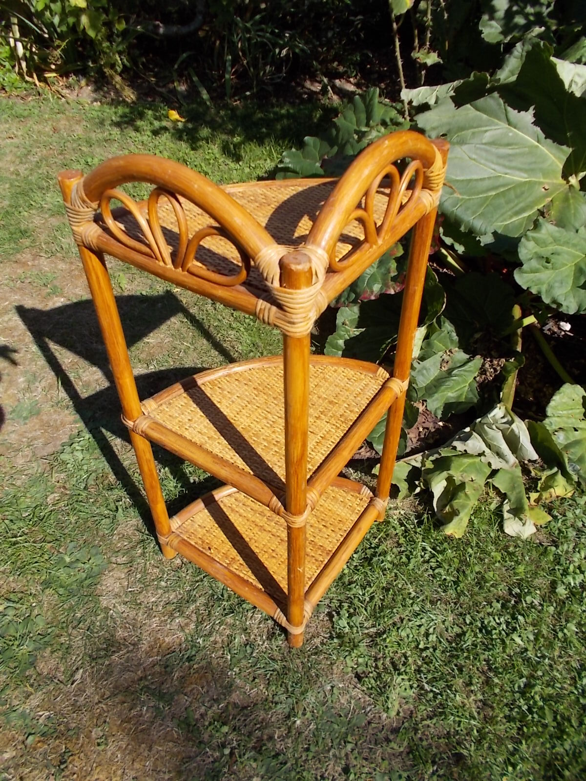 Rattan corner shelf