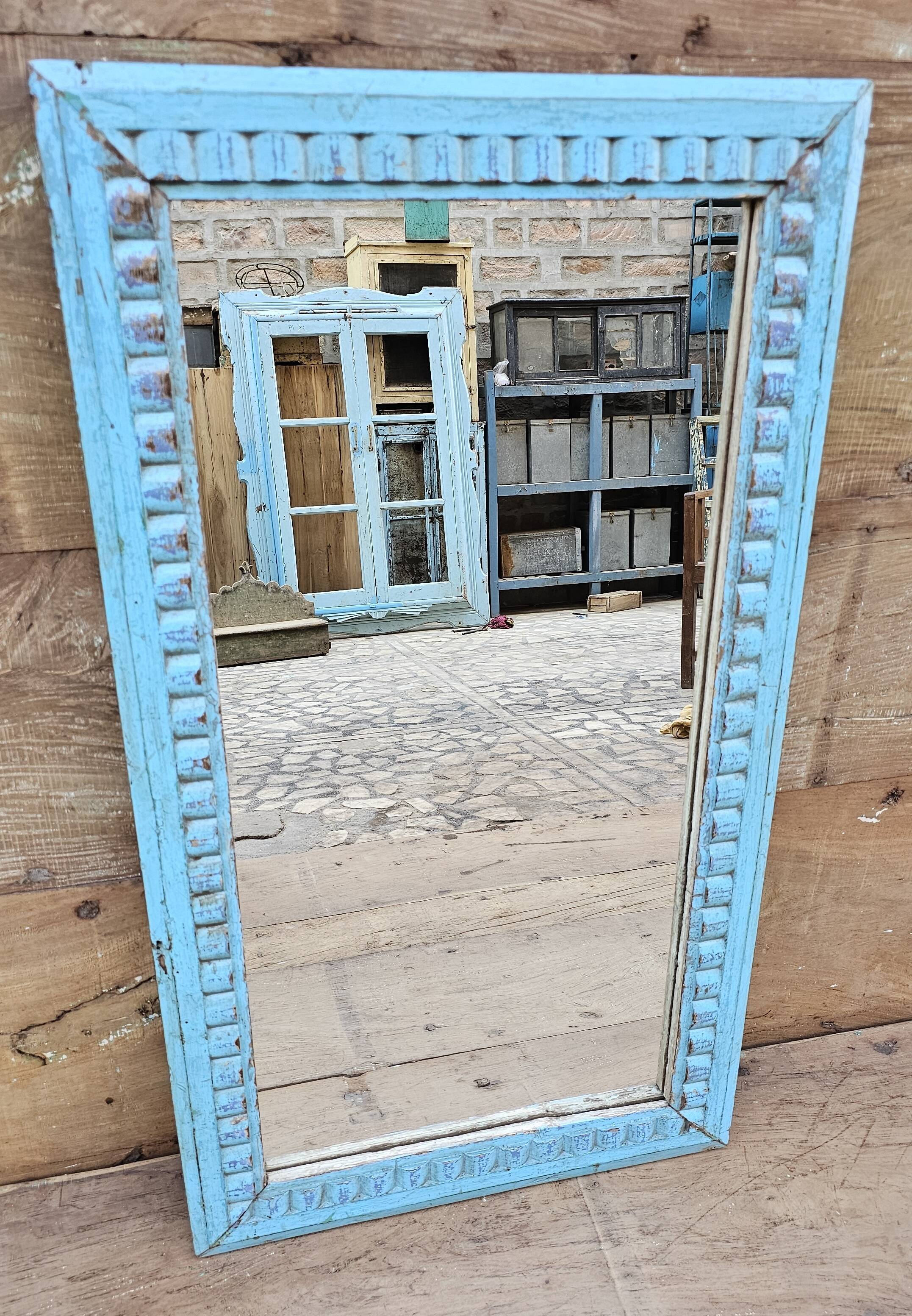 Antique Art Deco mirror in Burmese teak.