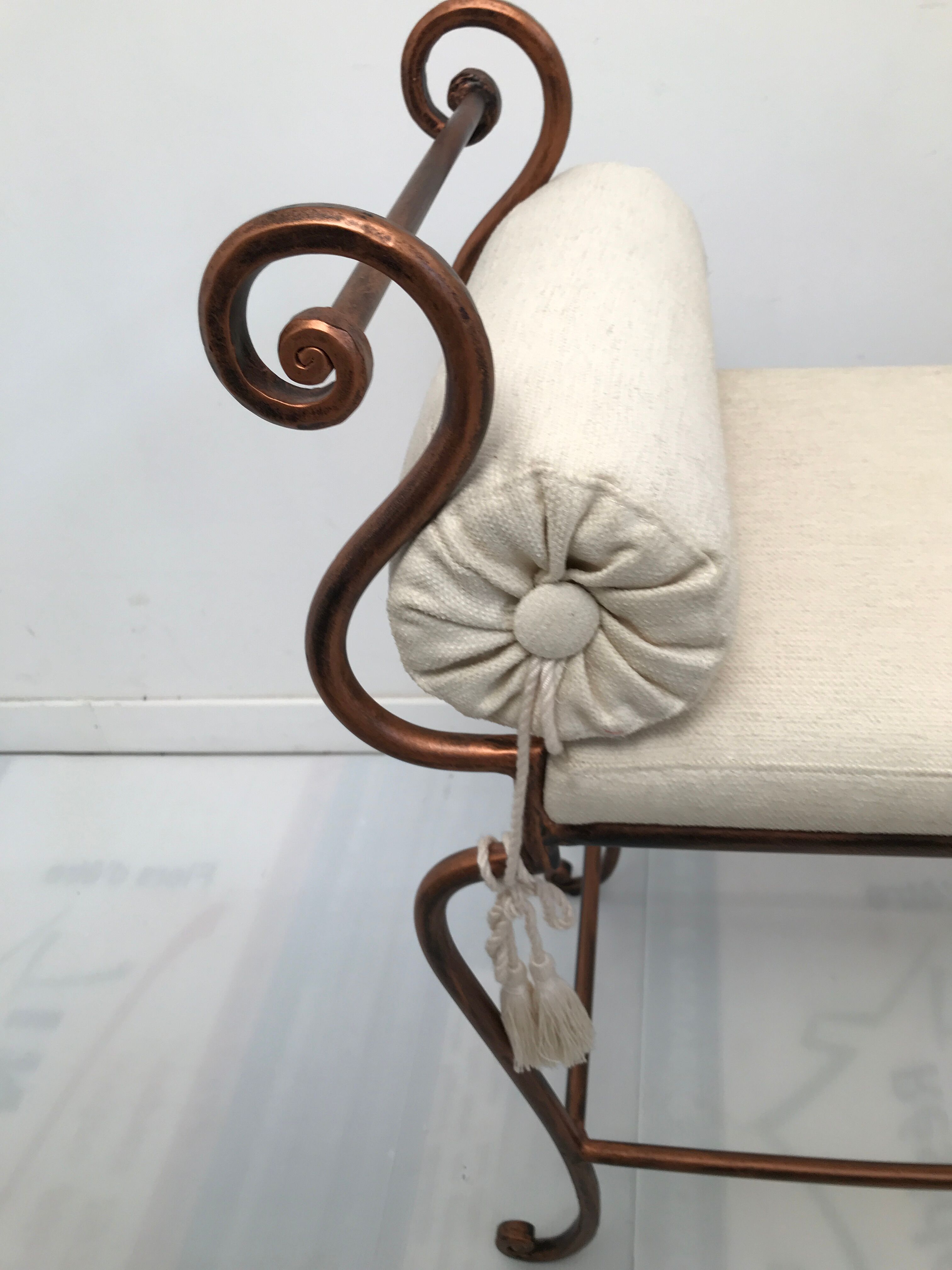 Copper wrought iron bench with cushions