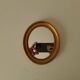 Small vintage oval mirror in gilded resin from the 60s/70s.