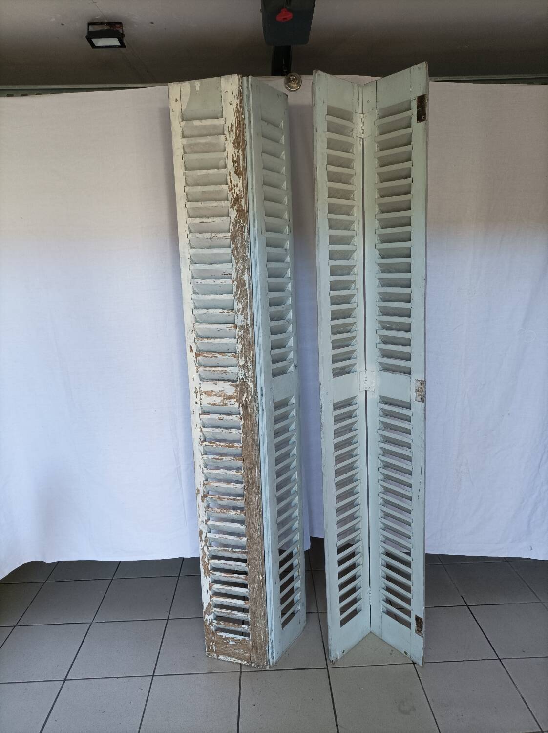 Louvered wooden shutter