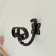 Pair of antique wrought iron coat hooks