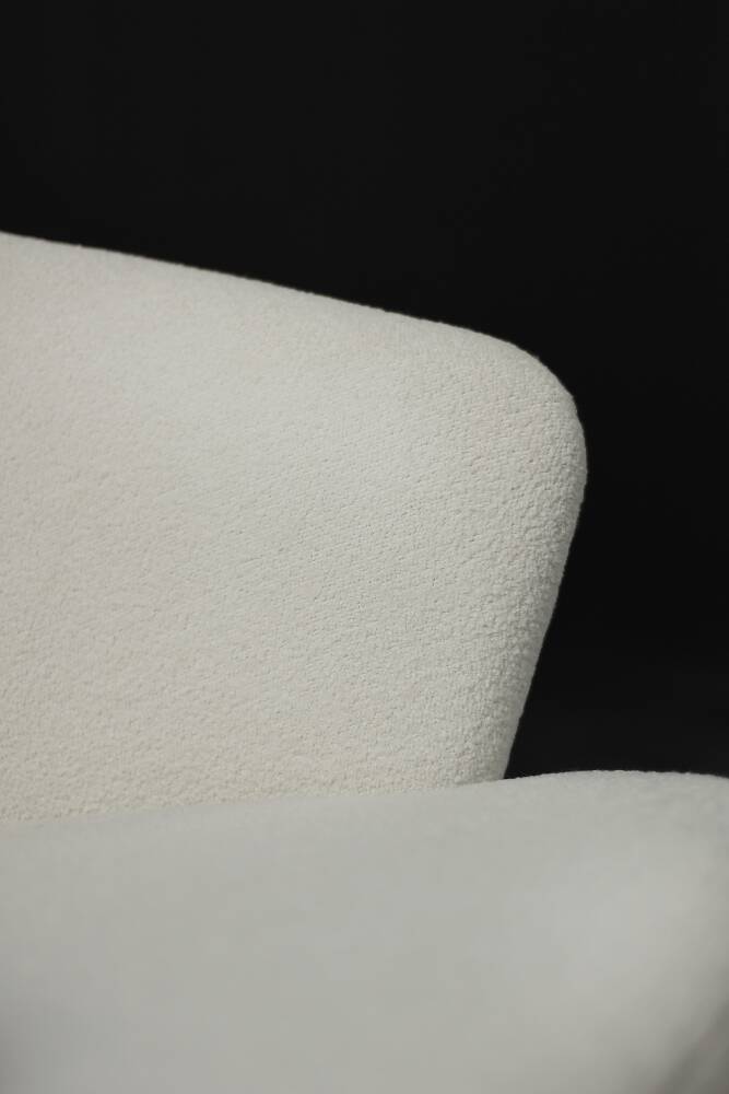 Low oak armchair with modern mid-century Scandinavian fabric and rounded backrest, 1960s.