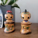 Two Kokeshi dolls