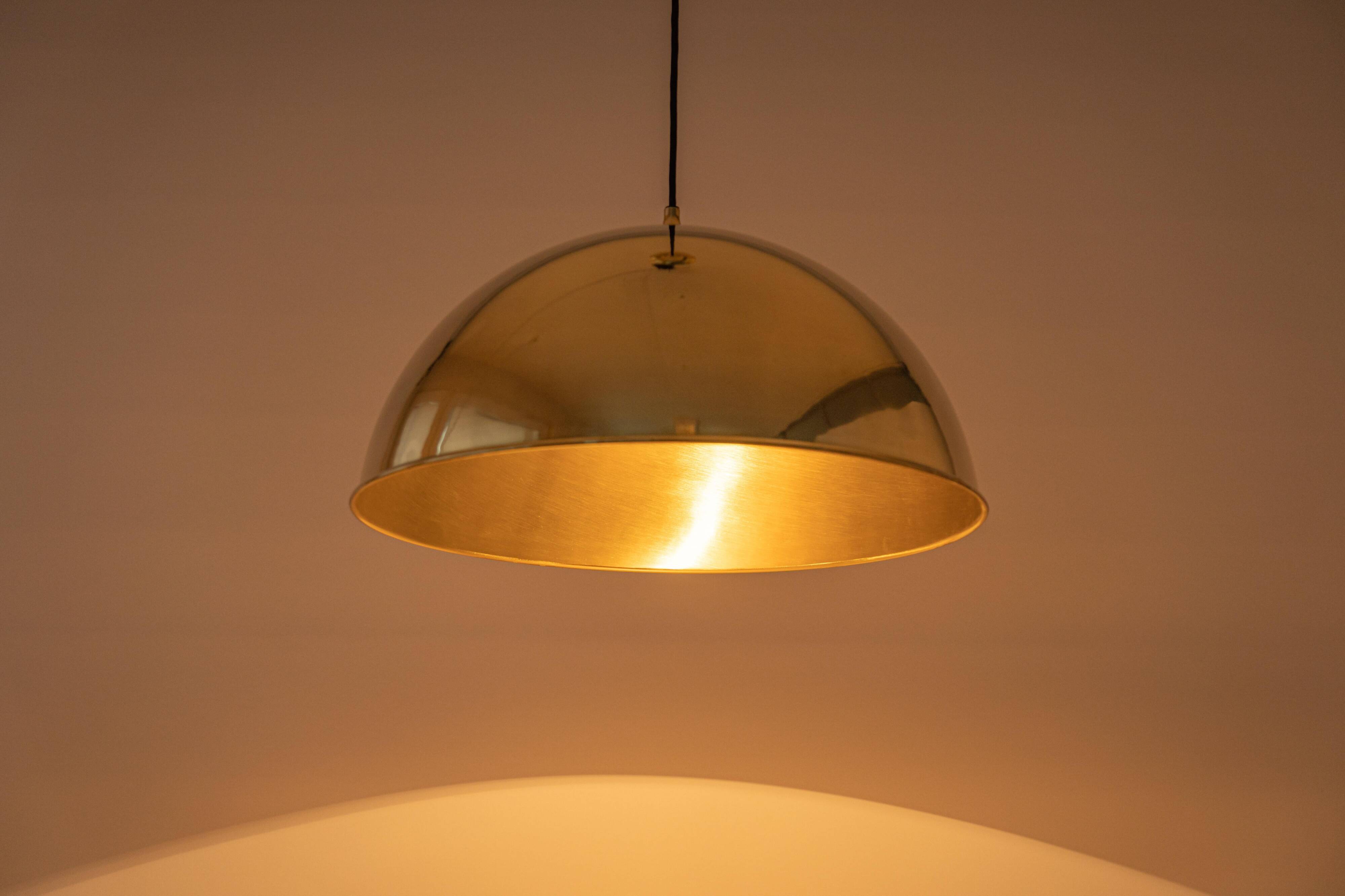 Large suspended brass chandelier by Florian Schulz, Germany.