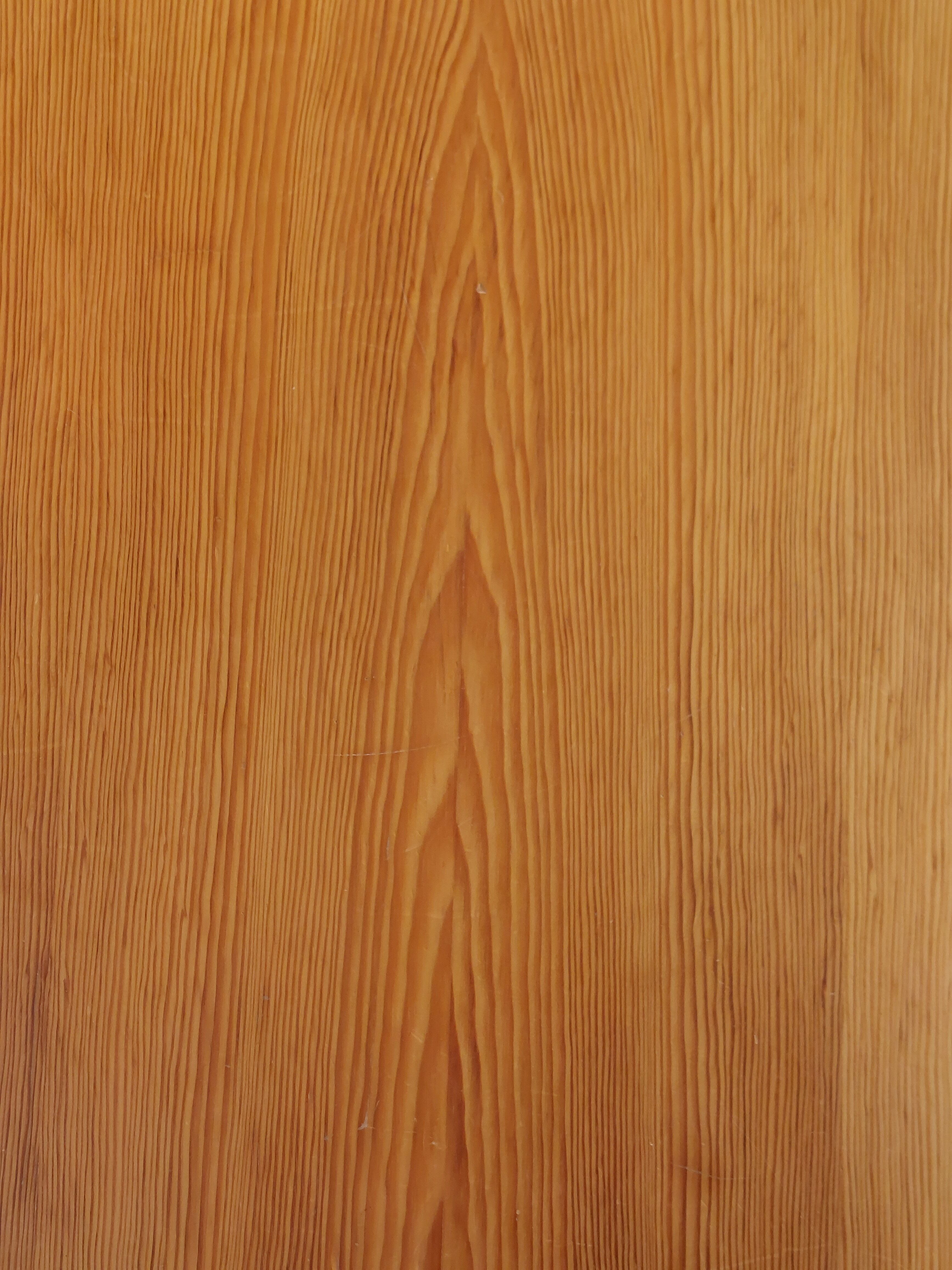 Meticulously crafted vintage pine side table, a masterpiece.