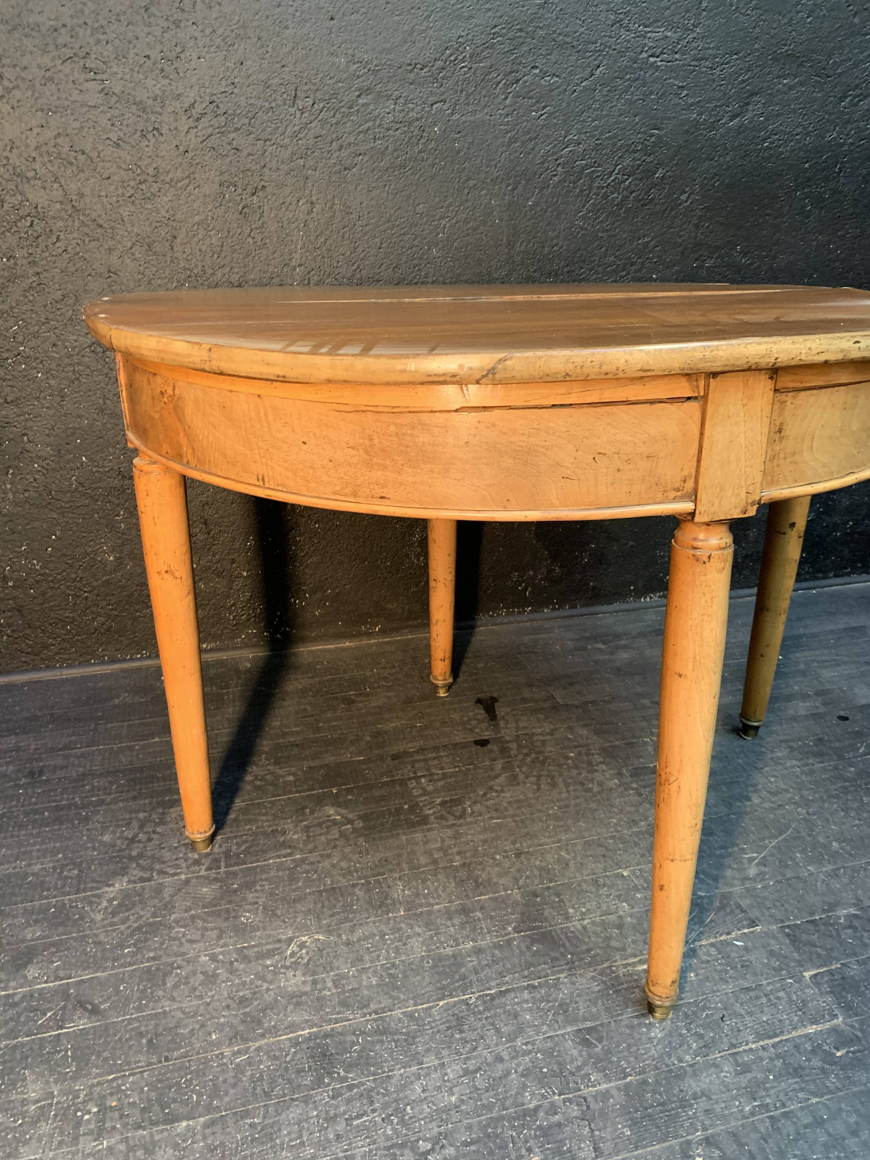 Former Louis XVI-style half moon table 19th century