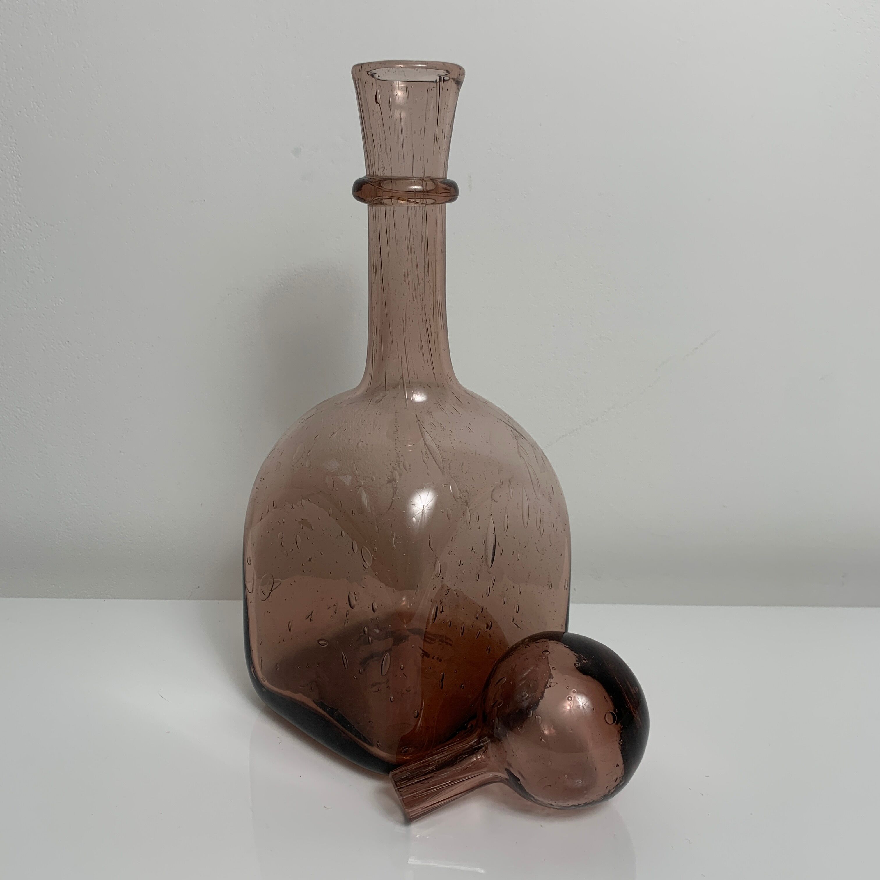 Bottle decanter in bubbled blown purple glass glassware from Biot