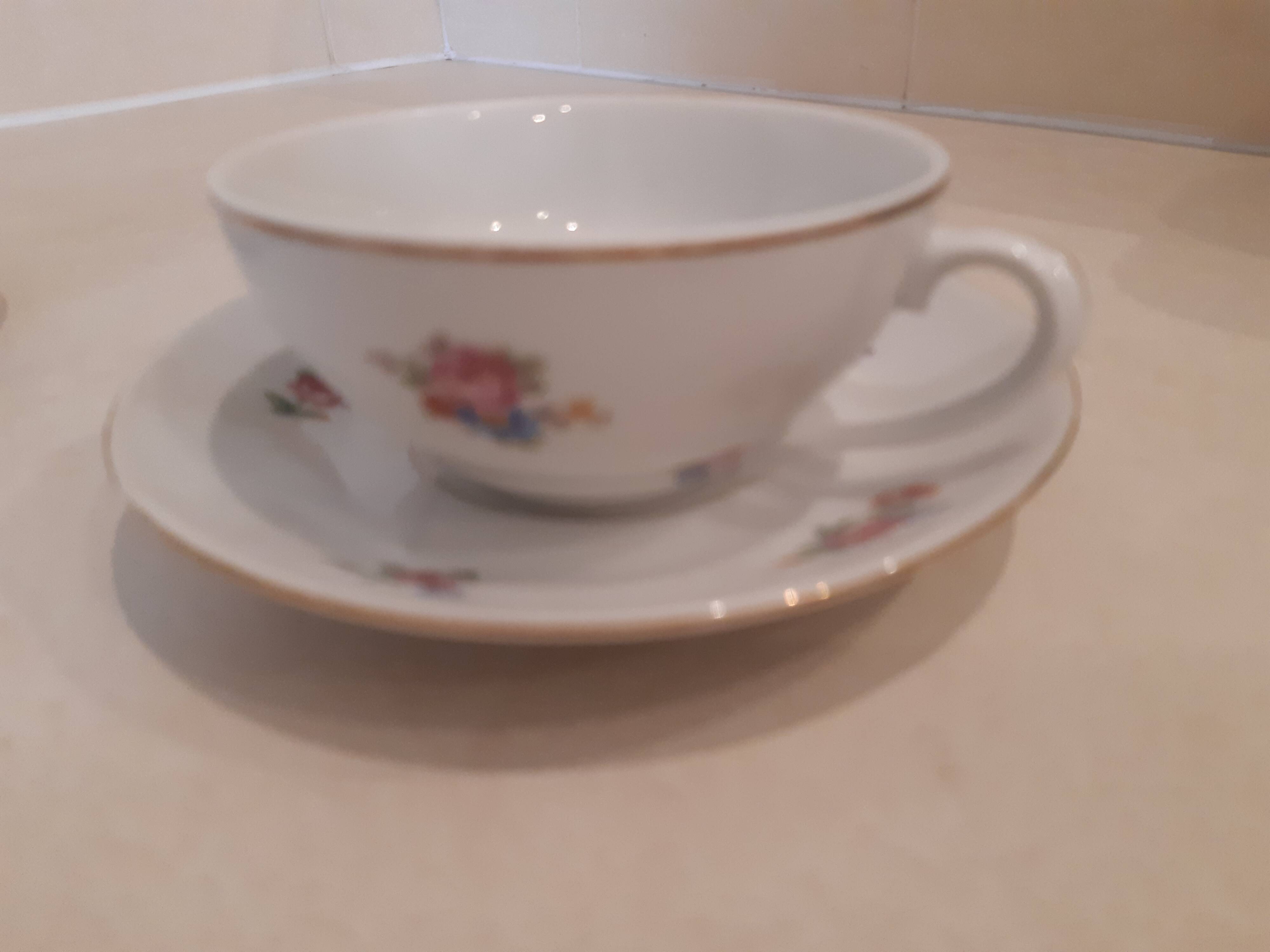 Breakfast set in white porcelain with floral decoration, 1930s.