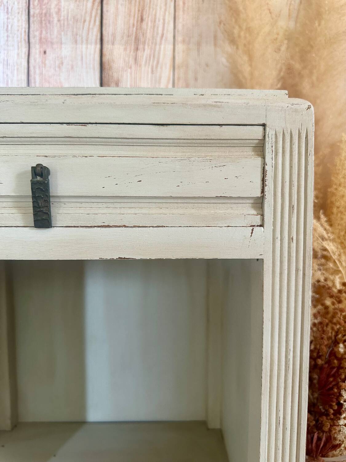 White patinated bedside table with a marble top