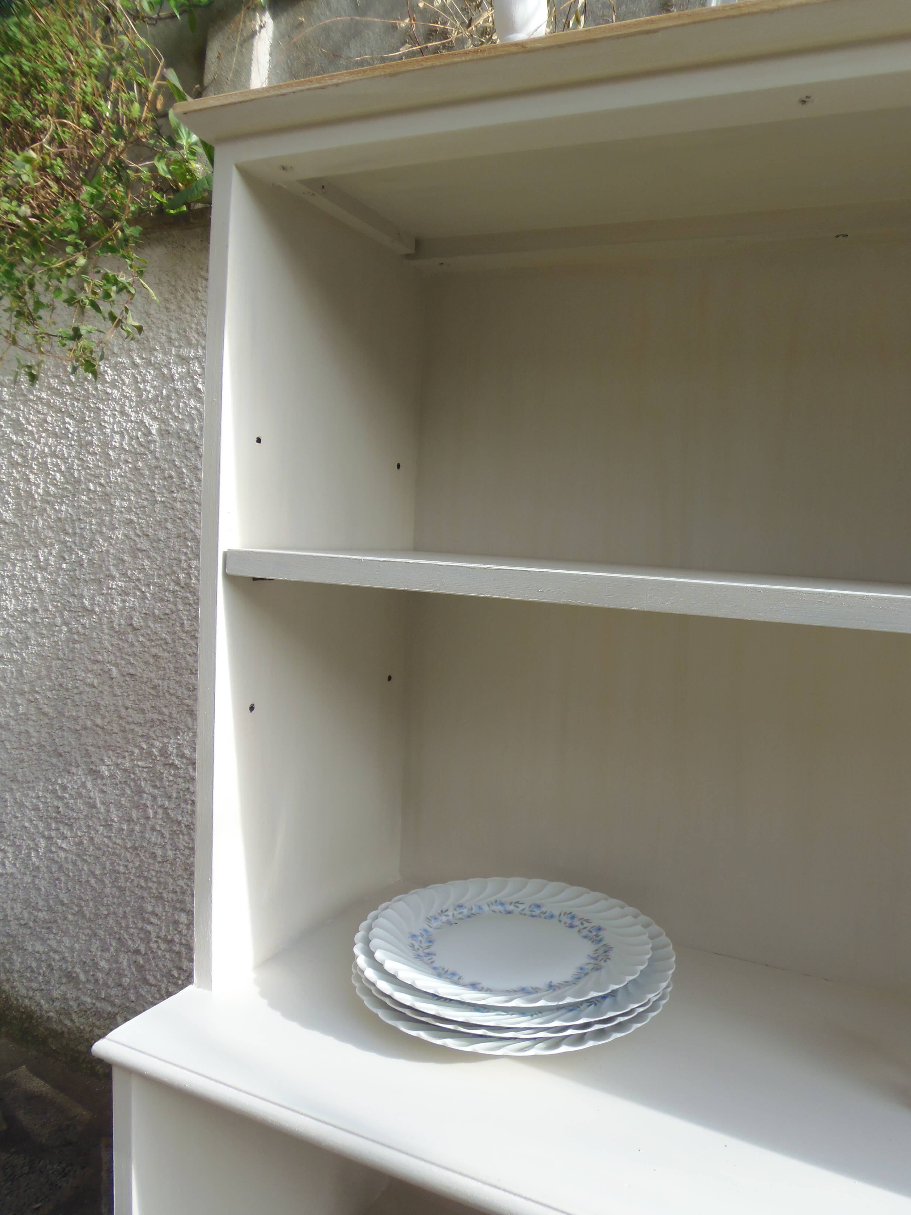 Vintage library enhanced in beige, wooden top.