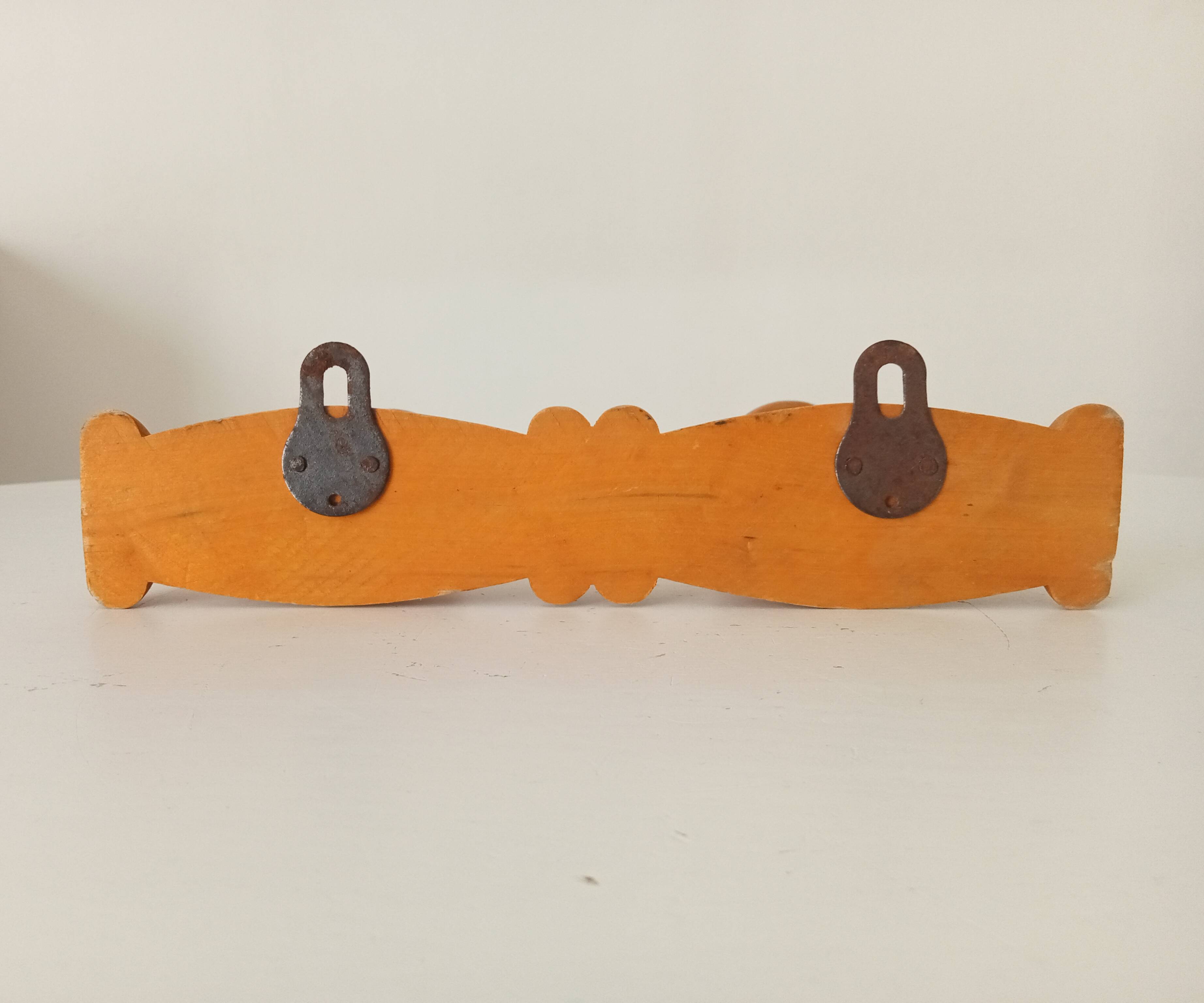 Small vintage wall-mounted coat rack with chinoiserie design
