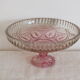 Small pink tinted molded crystal display cup