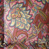 Small quilt filled with paisley pattern feathers