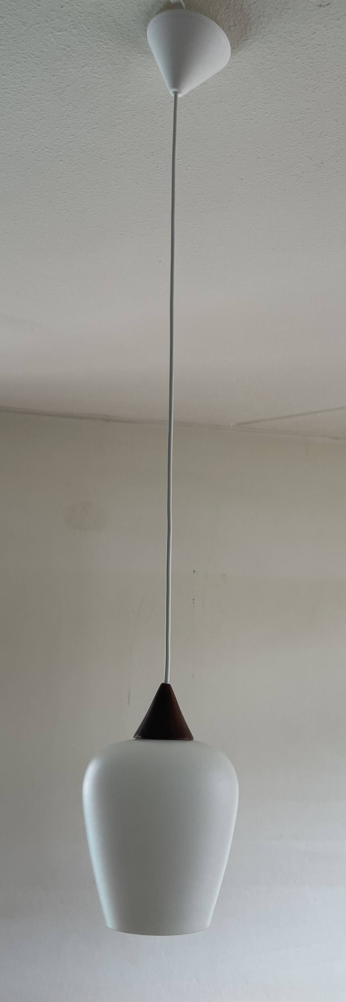 Danish teak and milk glass pendant lamp.
