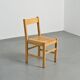 Set of six solid pine chairs by Maison Regain.