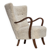 1960s, Danish design by Alfred Christensen, reupholstered, sheepskin.