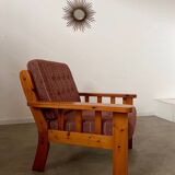 Old vintage Scandinavian design pine armchair from the 70s