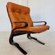 Vintage Scandinavian cognac lounge chair by Oddvin Rykken