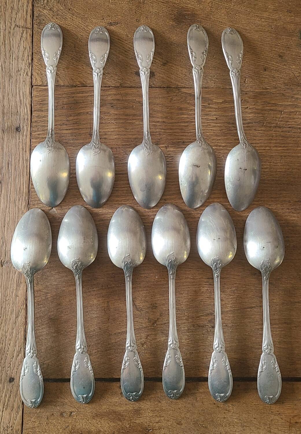 Set of 12 antique silver-plated metal soup spoons