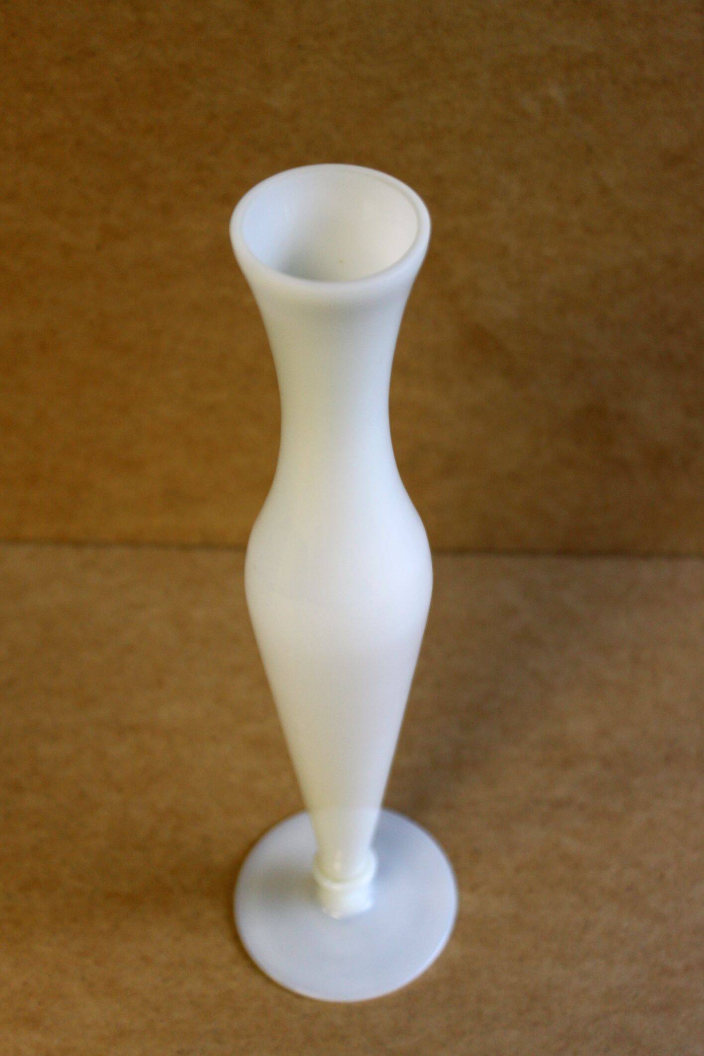 White opaline single-flower vase.