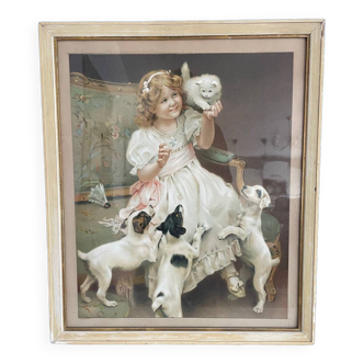 Framed reproduction painting of little girl with dog and white kitten