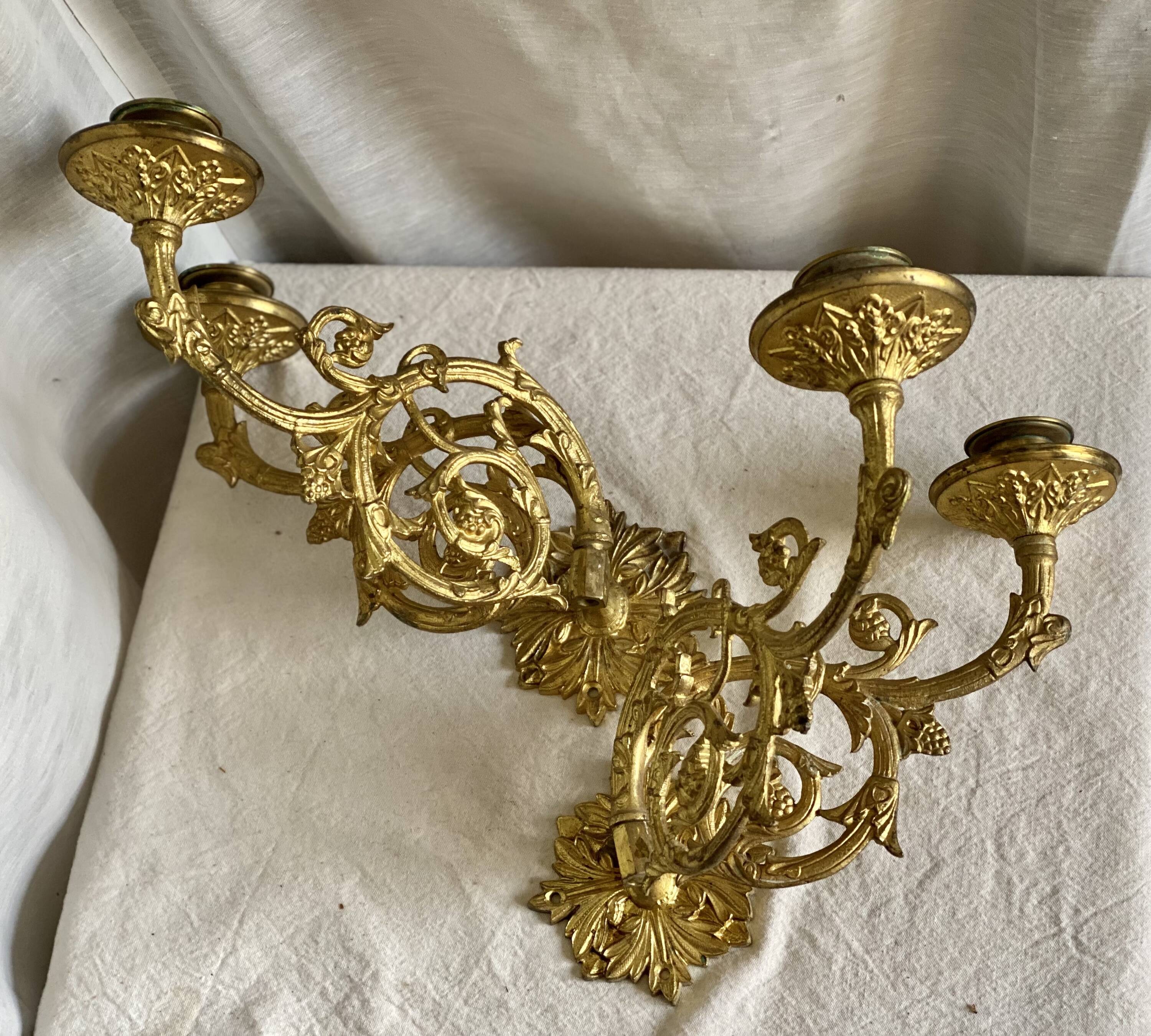 Pair of gilt bronze wall candlesticks