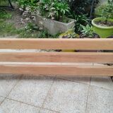 Garden bench with old cast iron legs