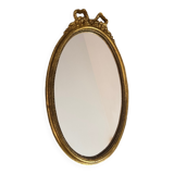 Oval gold knot mirror