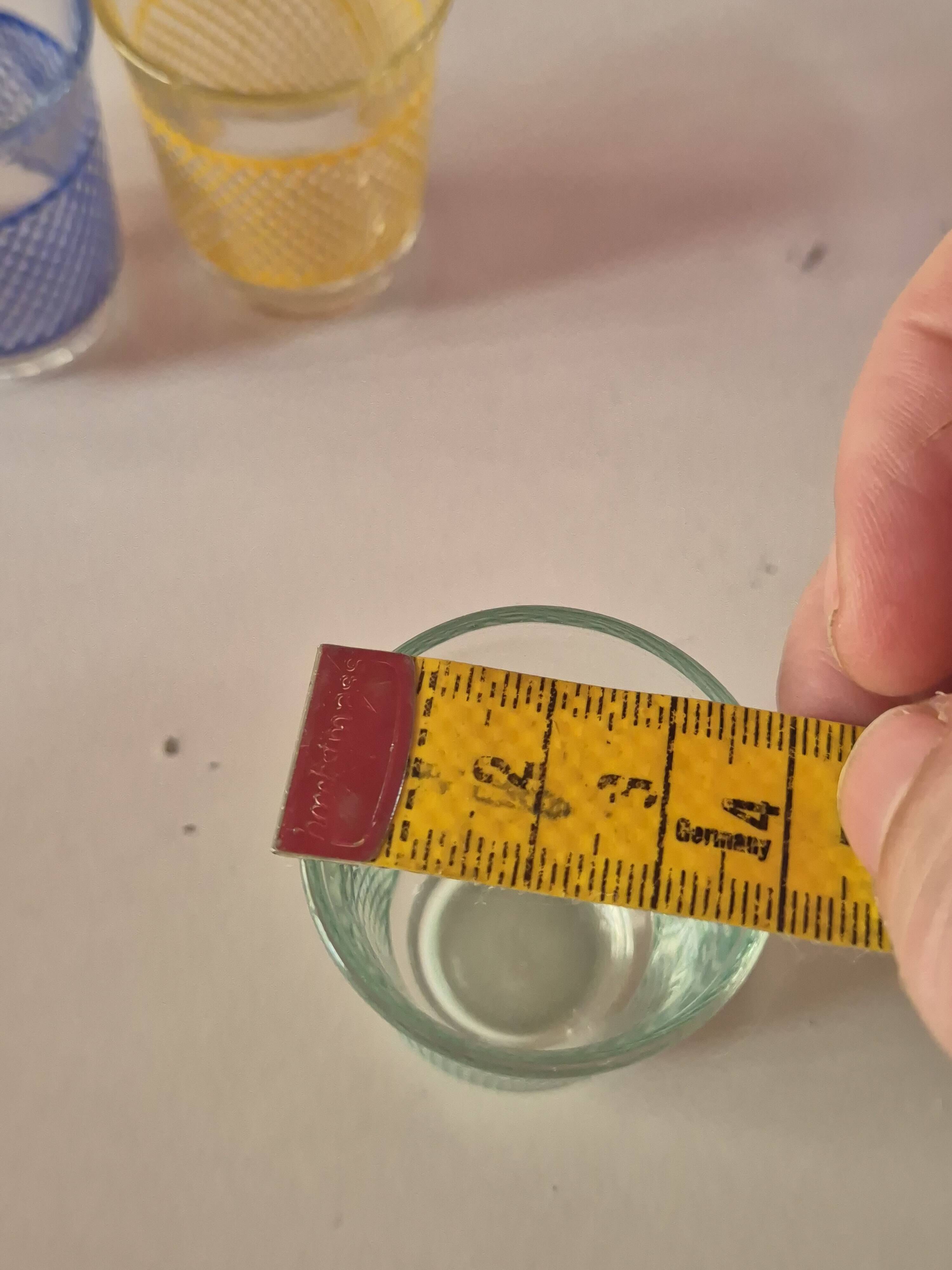 set of 4 vintage liqueur glasses in yellow, green, and blue