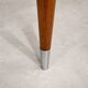 Vintage extendable dining table with tapered legs.