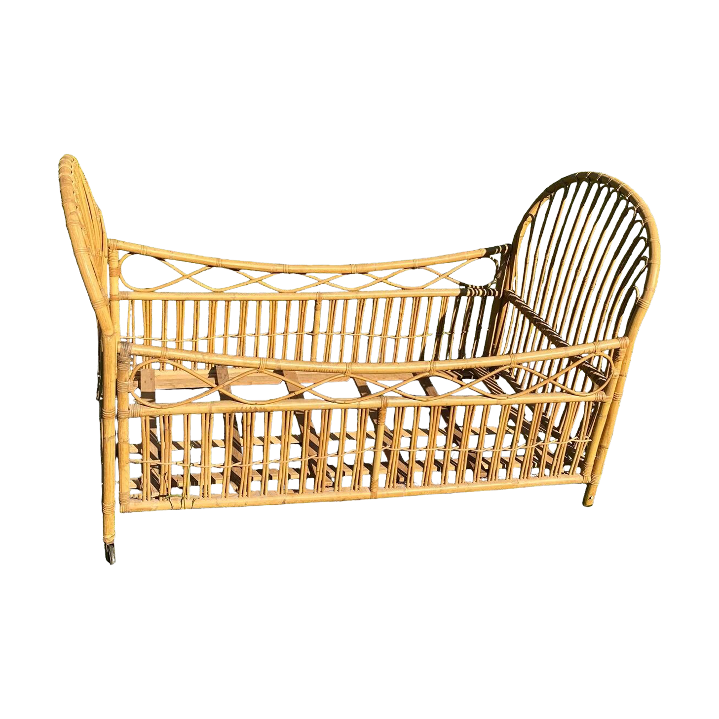 Children's bed in vintage rattan
