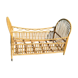 Children's bed in vintage rattan