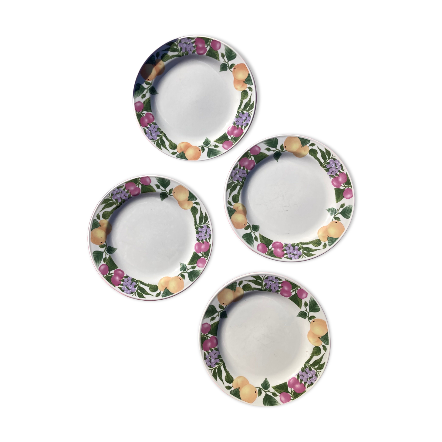 Old plates with fruit decoration