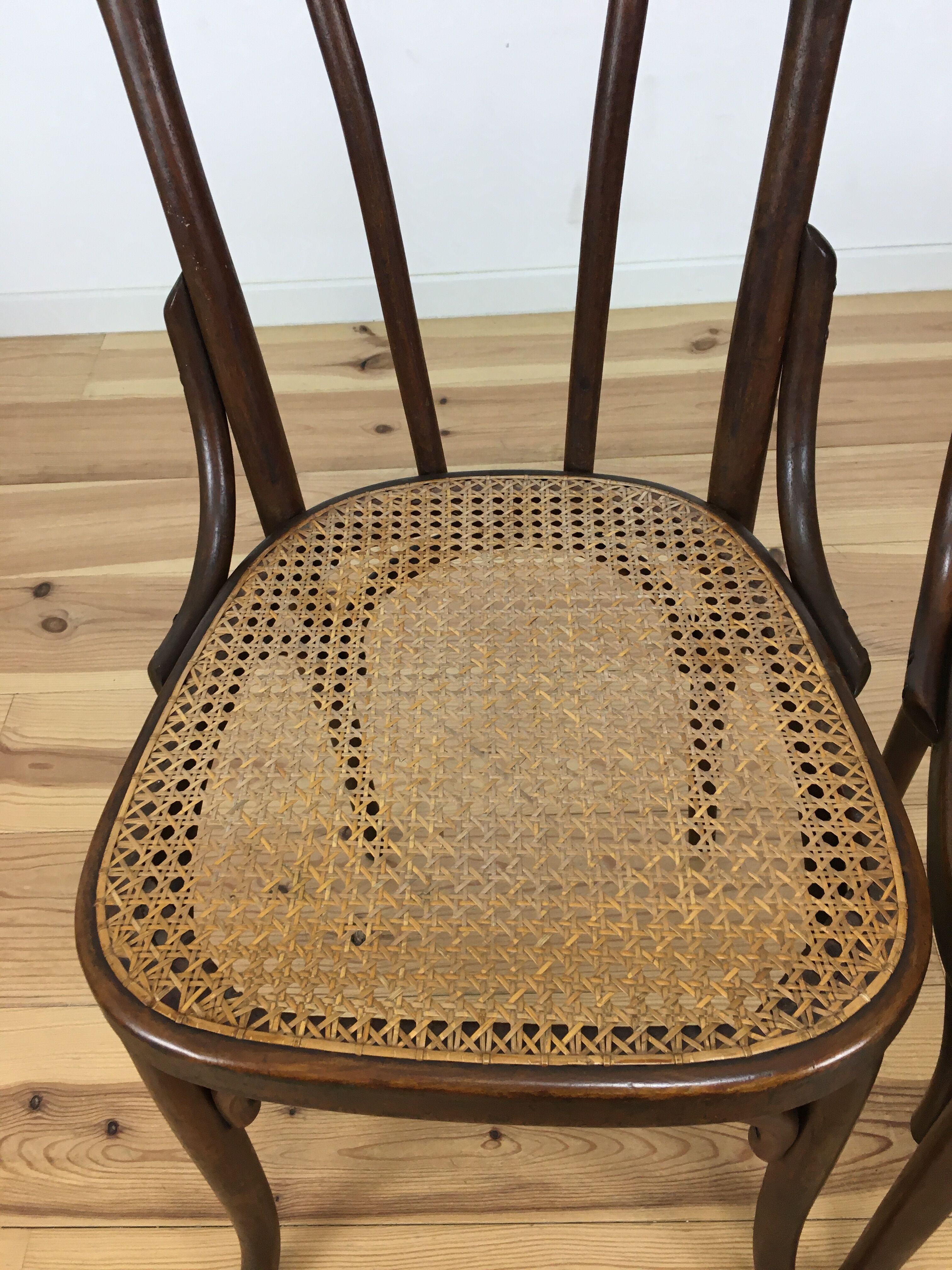 2 chairs in curved wooden and canning