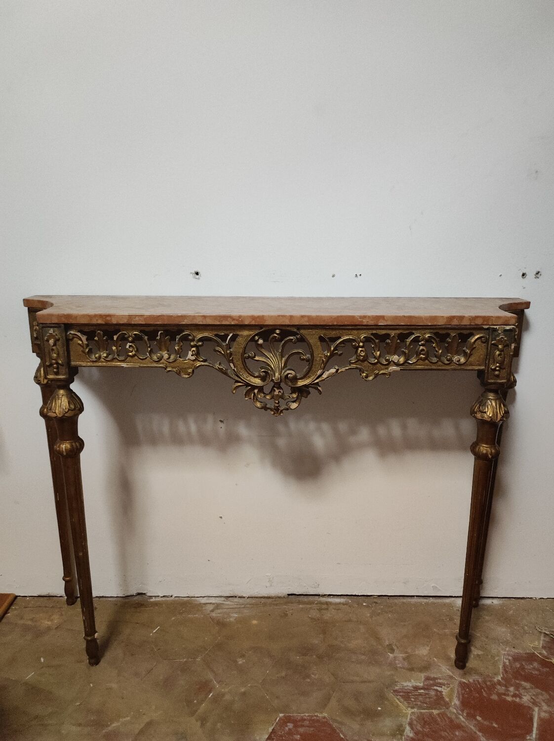 Console in gilded wood and red marble from the 1920s