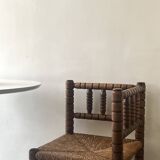 Corner straw chair "fireplace corner" in turned and beaded wood