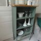 Small vintage bookcase enhanced in smoky green
