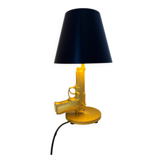 Bedside gun lamp philippe starck